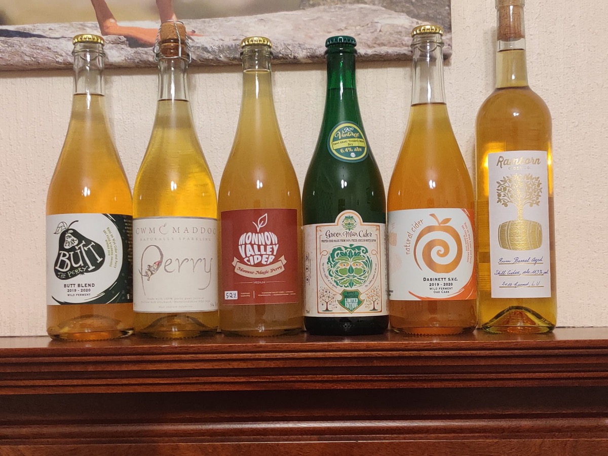 A line-up of perry and cider bottles including Cwm Maddoc, Monnow Valley and Ross-on-Wye