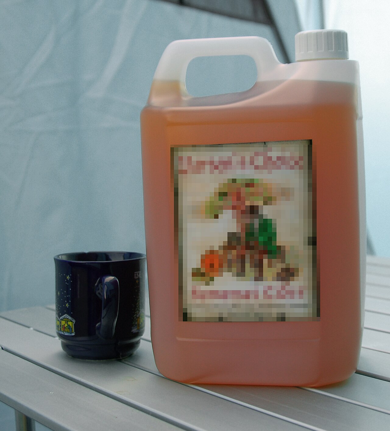 A glass of cloudy Somerset scrumpy cider